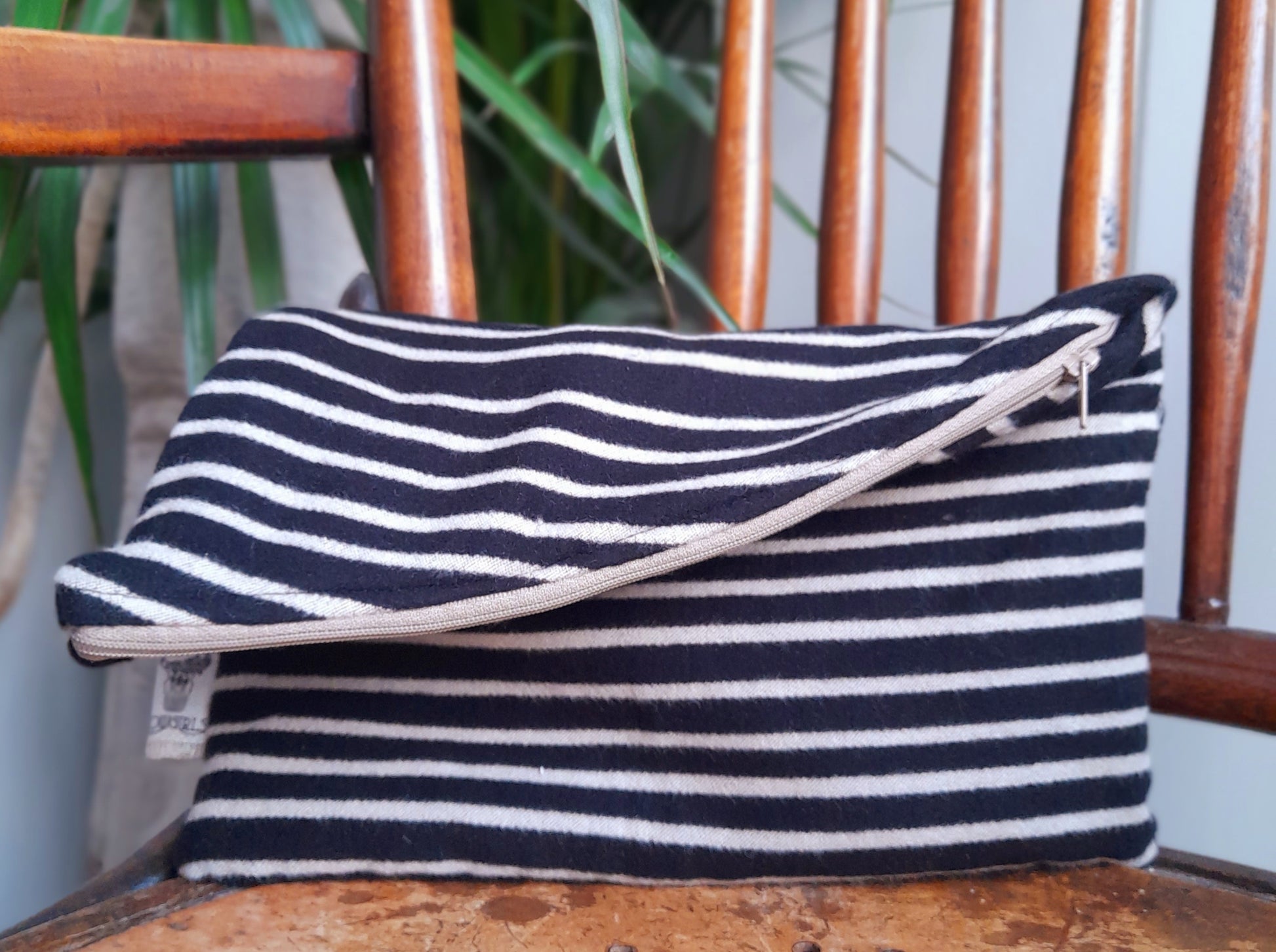 Black & white striped clutch bag by Assortia